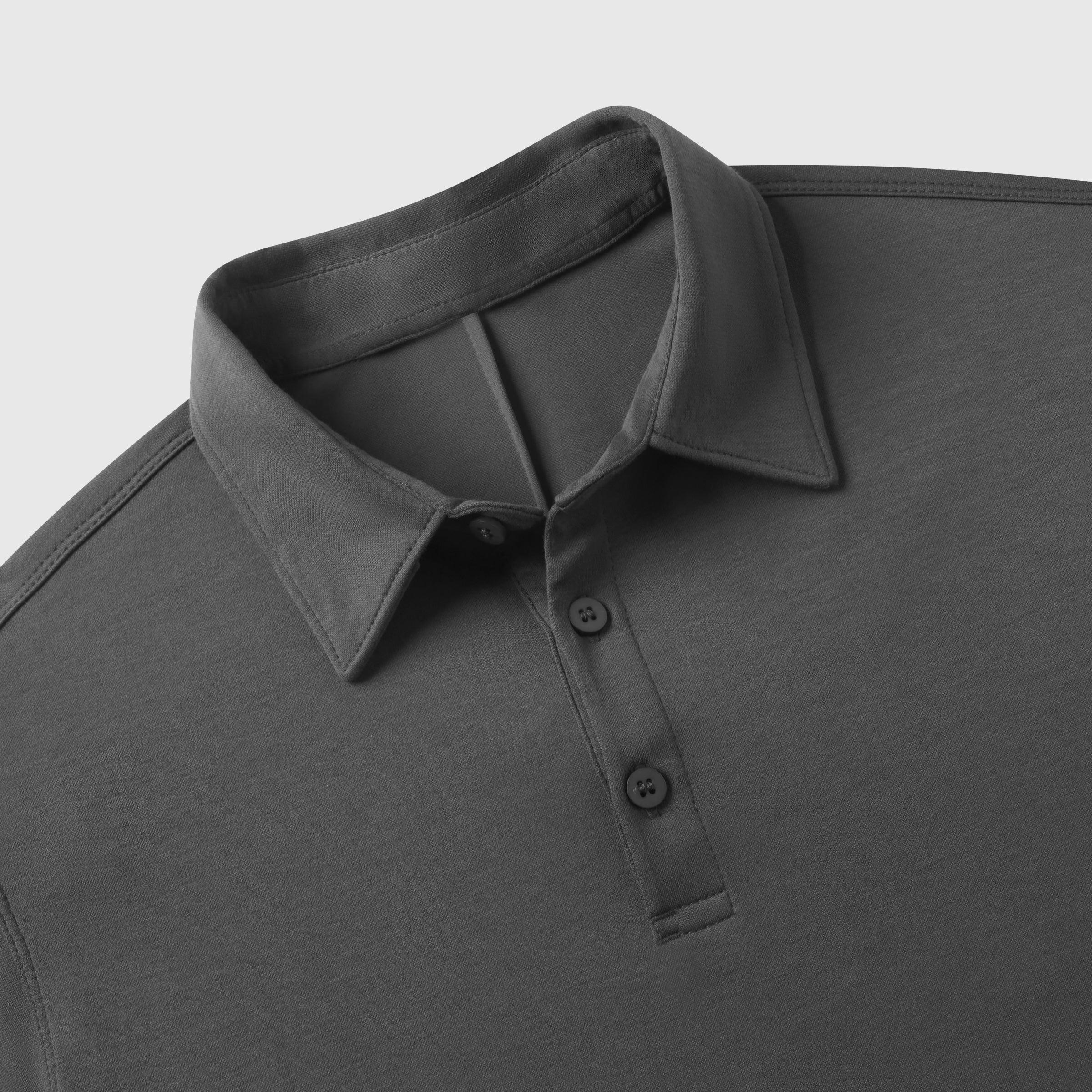Modern charcoal Tech Polo with structured collar and tailored fit.