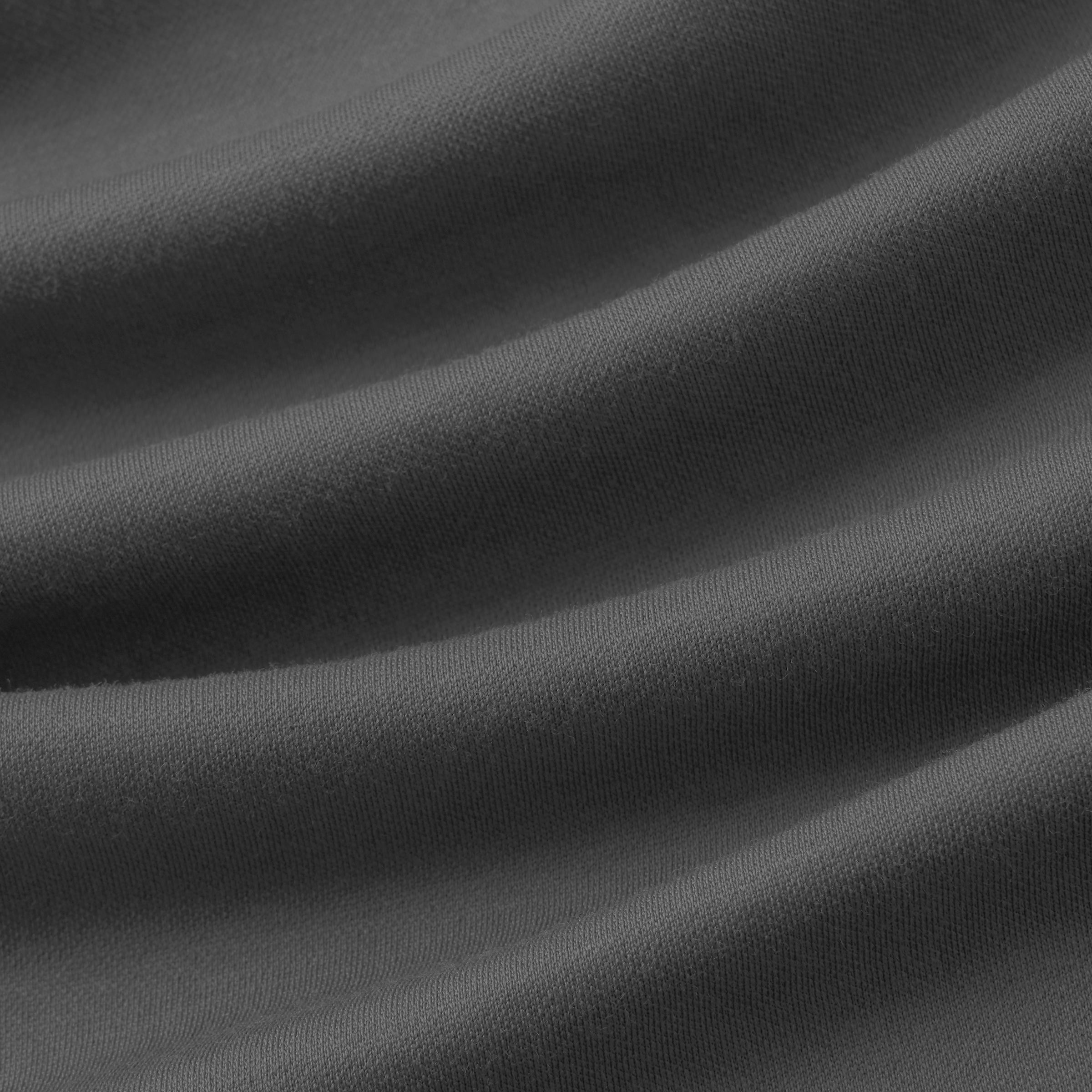 Smooth, modern fabric texture of the Jetsetter Tech Polo in grey.