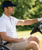 A man wearing the Clubhouse Pique Polo in White Drive line