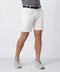 A man wearing the Jetsetter Tech Short 7" in True White