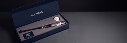 A signed baseball bat, signed baseball and a $500 Jack Archer gift card in a navy presentation box.