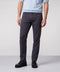 A man wearing the Charter Twill Pant in Midnight