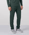A man wearing the Clubhouse Range Jogger in Alpine Green