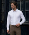 The Everywear Shirt Standard Length in True White worn in a lifestyle setting.