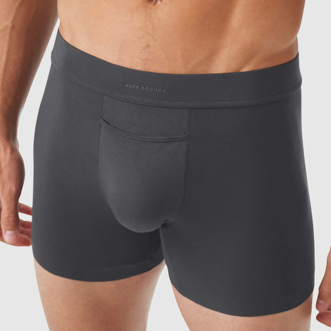 Jetsetter Boxer Brief in dark fabric with supportive pouch and comfortable waistband.