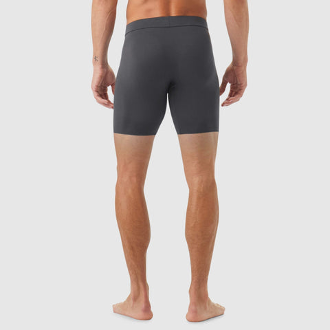 Back view of a man wearing Jetsetter Boxer Briefs in dark grey, showcasing a comfortable and seamless design with a wide waistband.