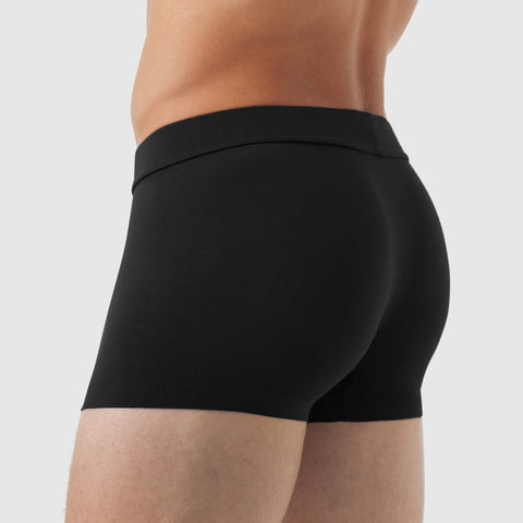 Man wearing black Jetsetter Boxer Briefs with seamless fit.