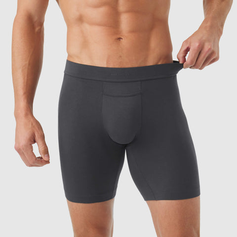 Male model wearing Jetsetter Boxer Briefs showcasing comfort and support with a seamless fit.