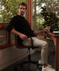 Super-soft organic cotton Precision Long Sleeve Tee in black, highlighting shoulders, wrinkle-resistant and breathable.