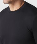 Precision Long Sleeve Tee made from soft organic cotton, emphasizing shoulders, in black.