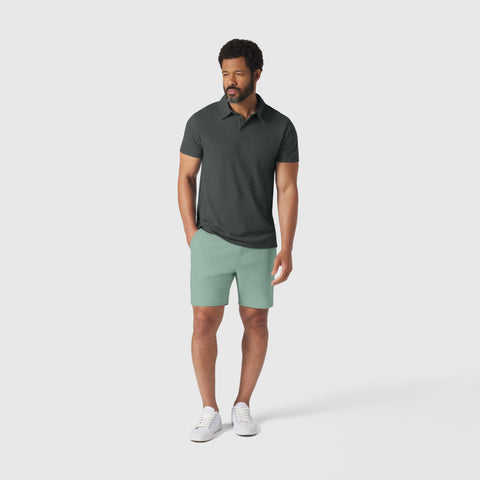 Jetsetter Tech Short 3-Pack modeled by person wearing green shorts and dark polo.