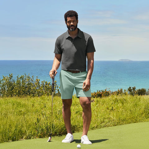 Jetsetter Tech Short 3-Pack golfer standing on a course near the ocean.