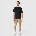 Jetsetter Tech Short 3-Pack in beige worn by a model with a black shirt.