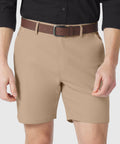 Jetsetter Tech Short in beige color with brown belt and black shirt.
