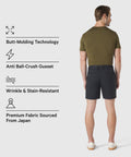 Man wearing Jetsetter Tech Short with features like butt-molding technology, anti ball-crush gusset, wrinkle and stain resistance, premium Japanese fabric.