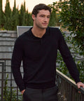 Man wearing Legacy Polo Sweater made from premium viscose blend.