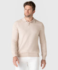 Refined beige Legacy Polo Sweater in premium viscose blend worn by model.