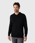 Man wearing a Legacy Polo Sweater made from premium viscose blend, showcasing its refined and versatile design.