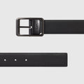 Reversible leather belt with black finish and silver buckle.