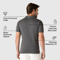 Tech Polo with tailored fit, posture-improving back seam, crisp collar, and bicep-enhancing sleeves.