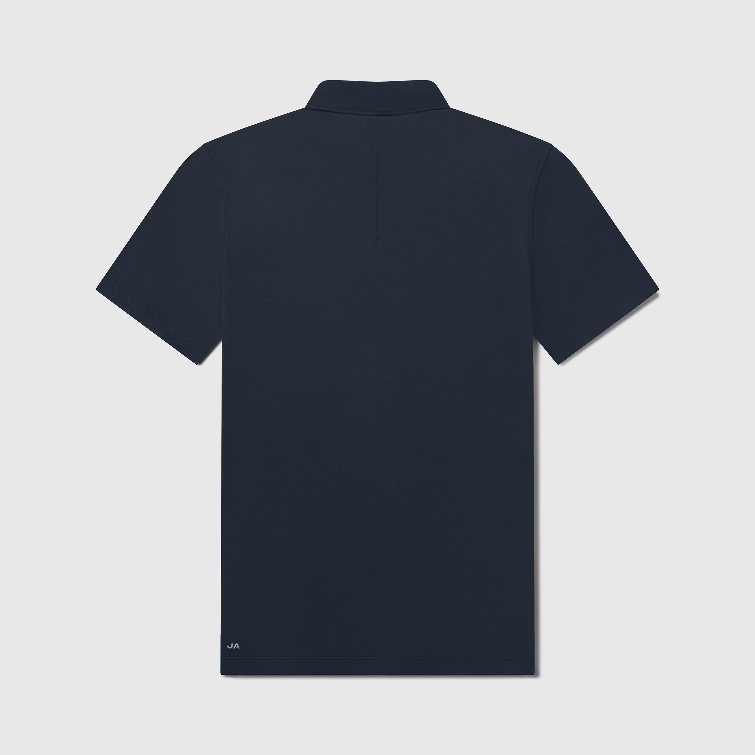 Back view of Jetsetter Tech Polo in black, featuring tailored cut and structured collar.