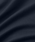 Close-up fabric texture of Tech Polo, showcasing smooth and structured material.