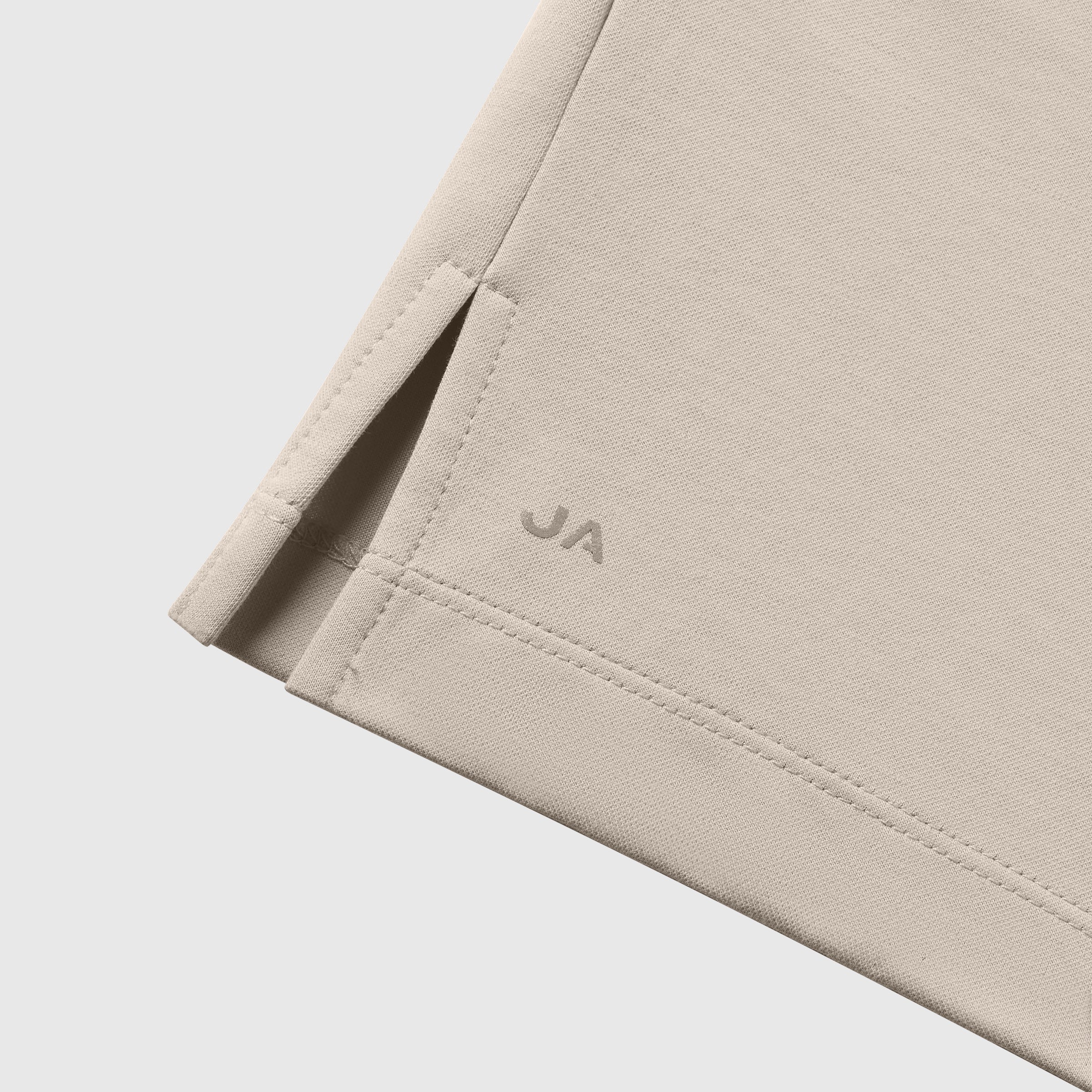 Beige Tech Polo with tailored cut and structured finish.