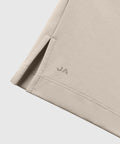 Beige Tech Polo with tailored cut and structured finish.