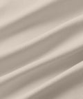 Jetsetter Tech Polo fabric texture in cream color.