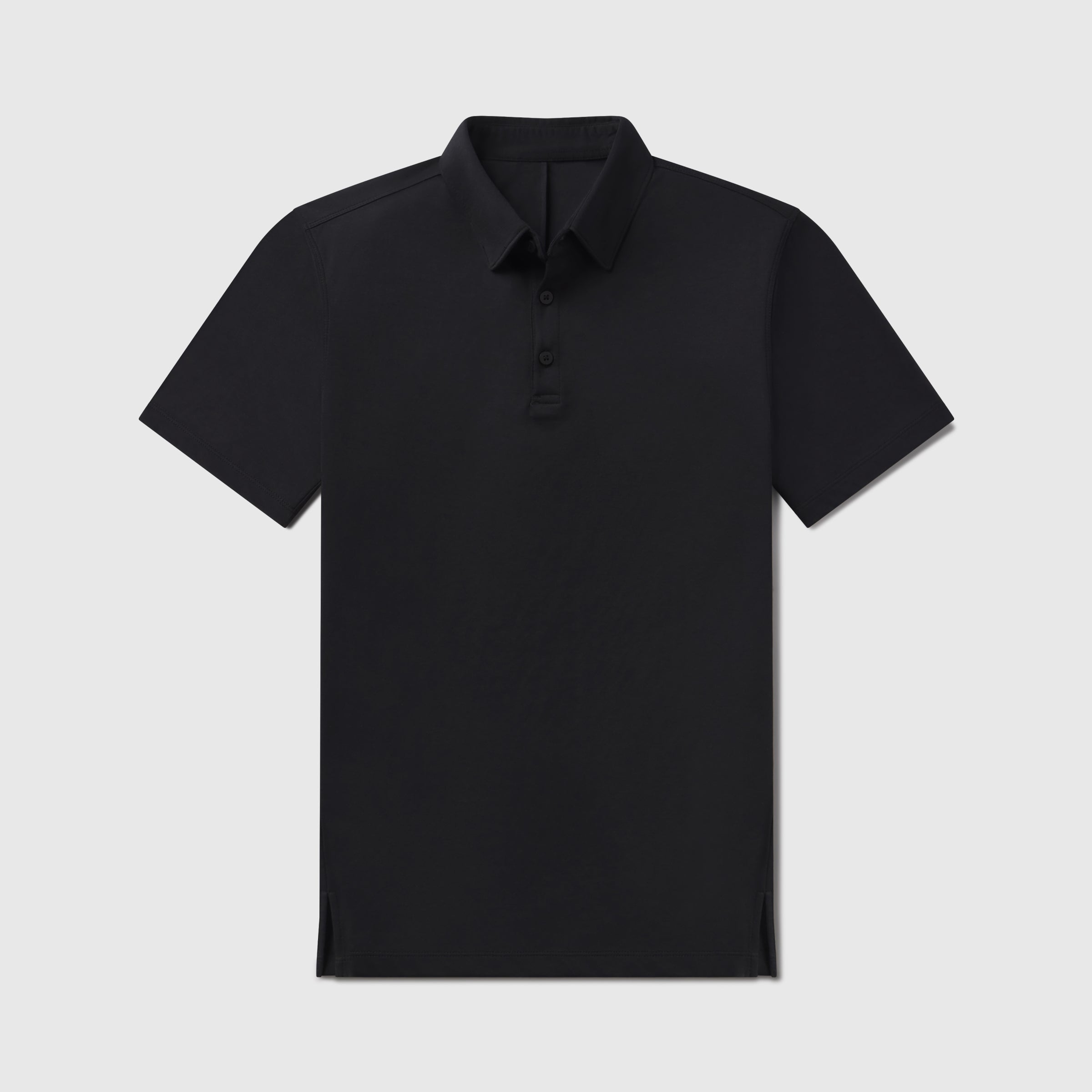 Black Tech Polo with tailored fit and structured collar, designed for comfort and performance.