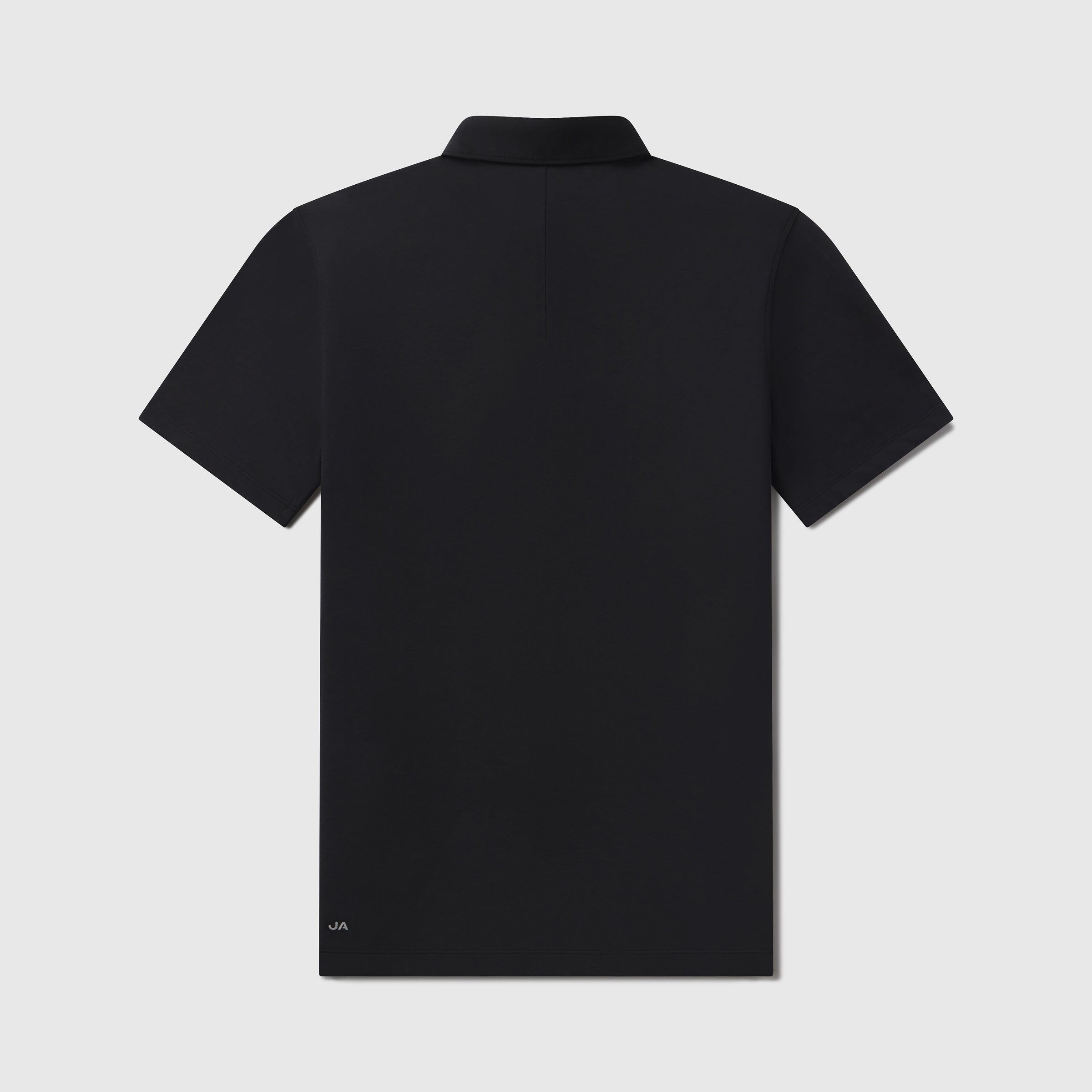Black Tech Polo with tailored fit, structured collar, and posture-improving design, ideal for work and travel.
