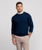 A man wearing the Anytime Crewneck Sweater in Deep Blue