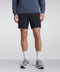 A man wearing the Atlas Short in Navy