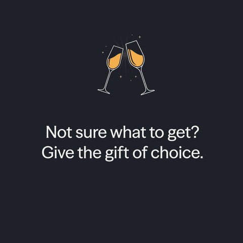 Not sure what to get? Give the gift of choice. Two champagne flutes on a charcoal background.