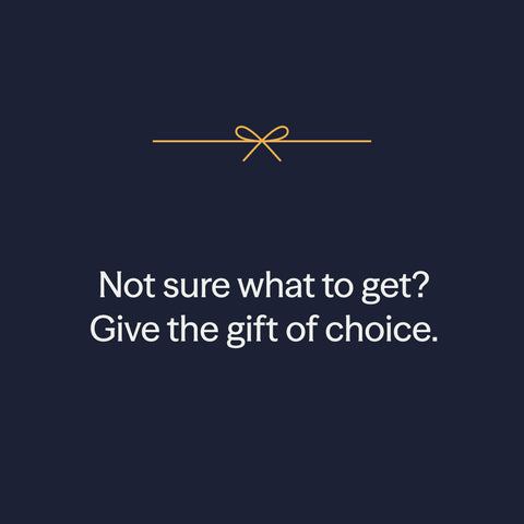Not sure what to get? Give the gift of choice. A gold ribbon and bow on a navy background.