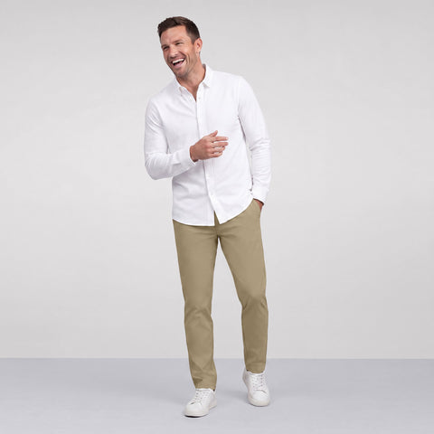 Side view of a man in the Jetsetter Tech Pant Slim Fit, True Khaki