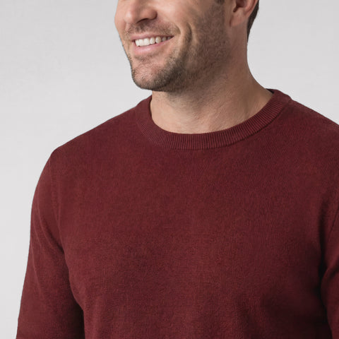 A man wearing the Anytime Crewneck Sweater in Maroon, lifestyle moment