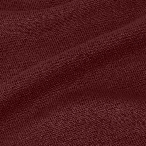 A man wearing the Anytime Crewneck Sweater in Maroon in everyday life