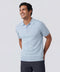 A man wearing the Legacy Resort Polo in Mist Blue, front view