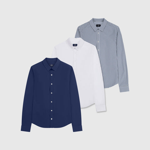 Three button-down shirts laid flat: navy, white, and navy check.