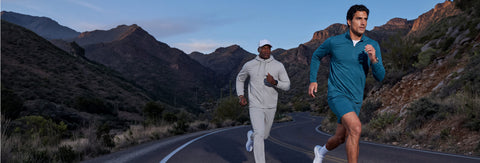 Clubhouse Range banner: two men running on a mountain road in quarter-zip tops and shorts