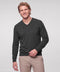 Dark heather gray V-neck sweater worn with stone chinos, front view.