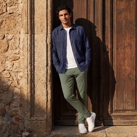 The Chambray Shirt in Dark Wash, laid flat on white