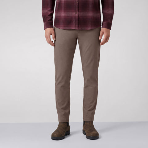 A man wearing Jack Archer Charter Twill Pant in Deep Taupe against a light background.