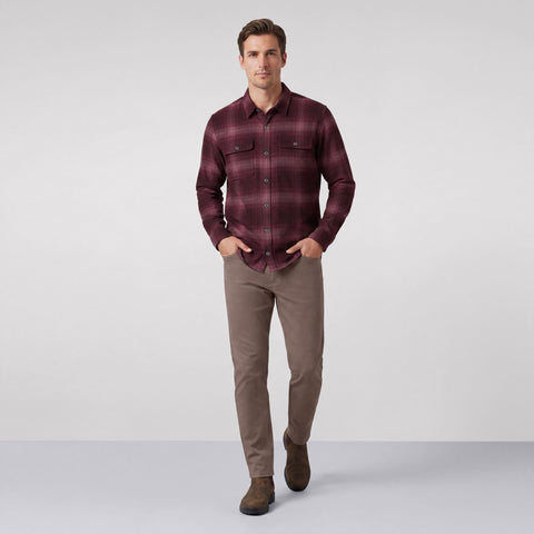 A man wearing Jack Archer Charter Twill Pant in Deep Taupe shown from a different angle.