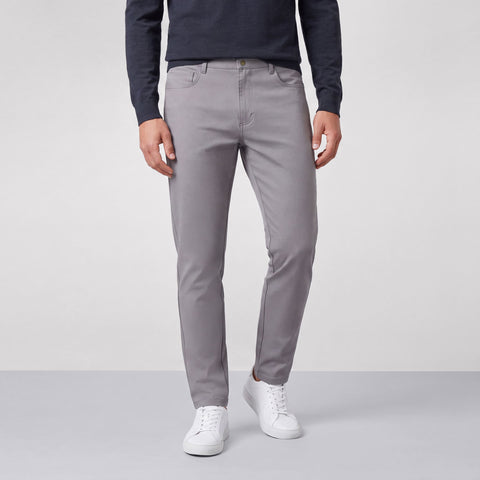 A man wearing the Charter Twill Pant in Granite