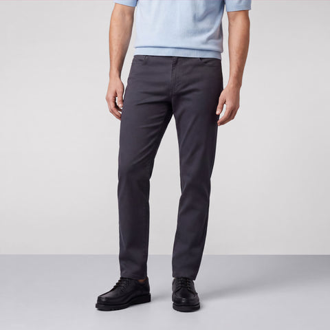 A man wearing the Charter Twill Pant in Midnight