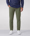 A man wearing the Charter Twill Pant in Olive