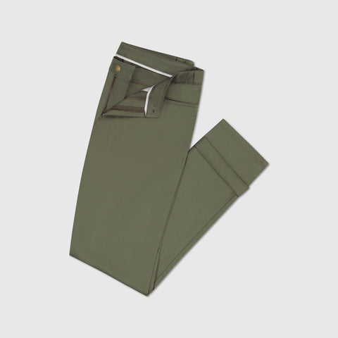 A man wearing the Charter Twill Pant in Olive in action