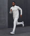 A man wearing the Clubhouse Range Jogger in Vapor Gray in action